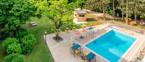 Seasonal outdoor pool, open 8:30 AM to 9:30 PM, sun loungers