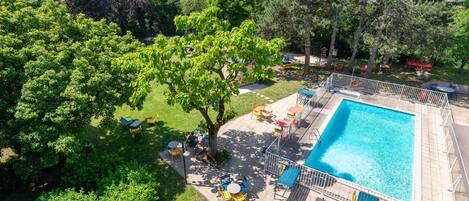 Seasonal outdoor pool, open 8:30 AM to 9:30 PM, sun loungers