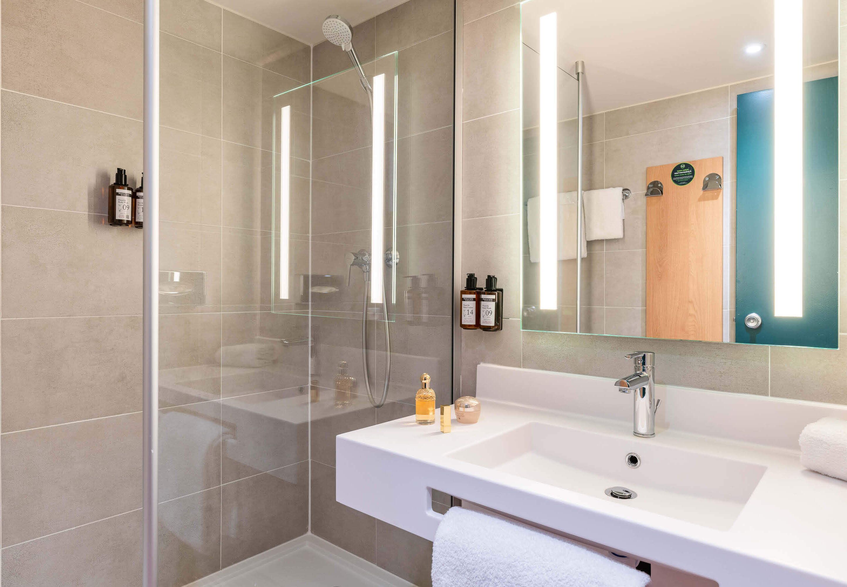 shower, eco-friendly toiletries, hair dryer, towels