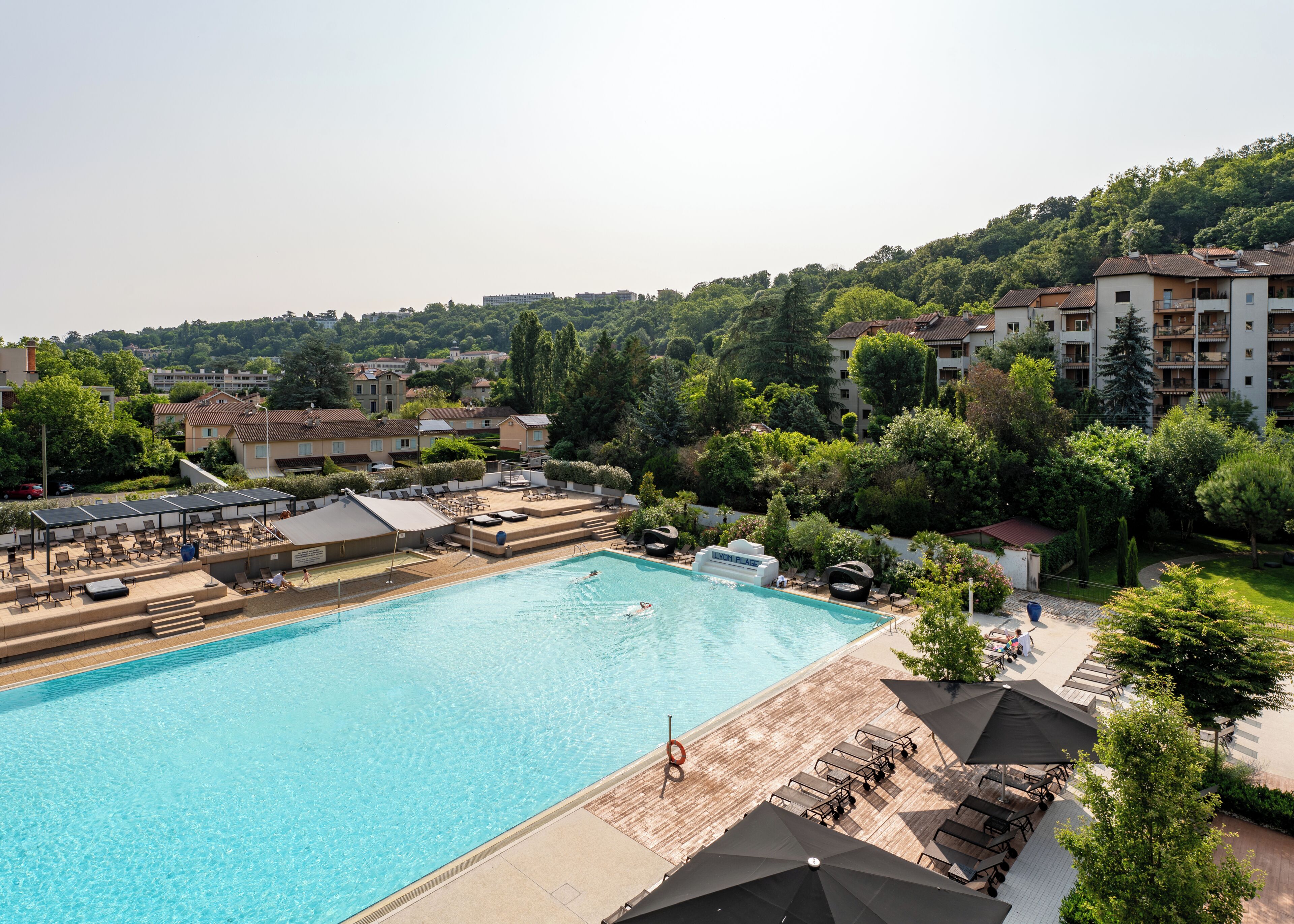 Indoor pool, seasonal outdoor pool, pool umbrellas