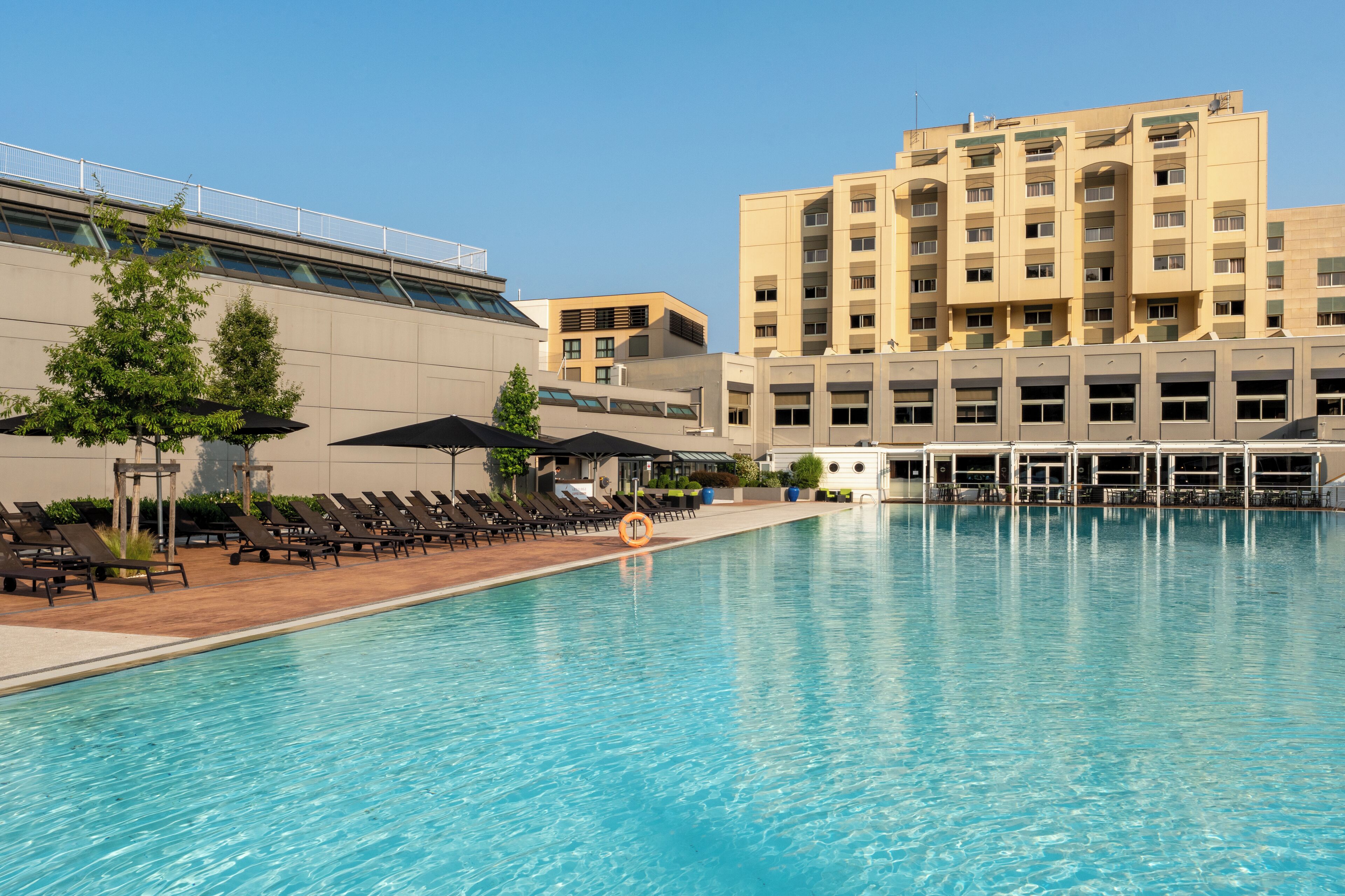 Indoor pool, seasonal outdoor pool, pool umbrellas