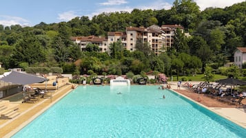 Indoor pool, seasonal outdoor pool, pool umbrellas