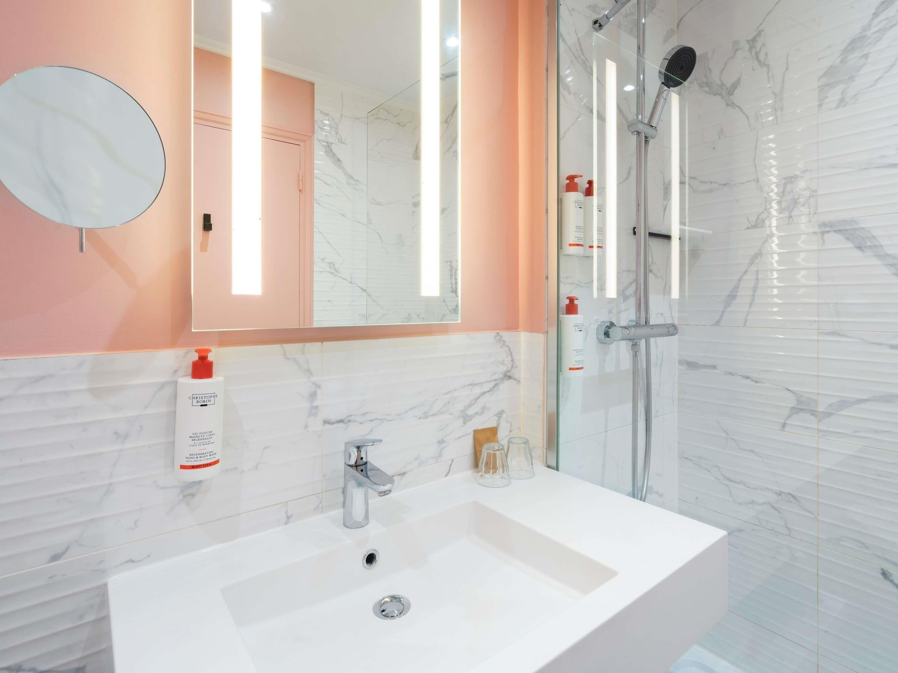 Eco-friendly toiletries, hair dryer, towels