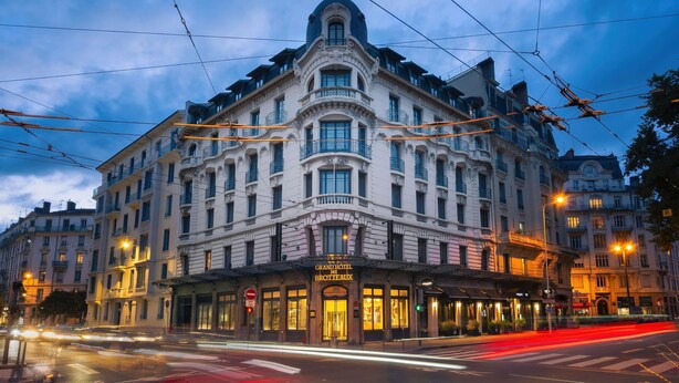 A grand hotel with a classic European architectural style, featuring multiple balconies and a prominent entrance. - Grand Hotel des Brotteaux Lyon Ctre - Handwritten Collection (Lyon)