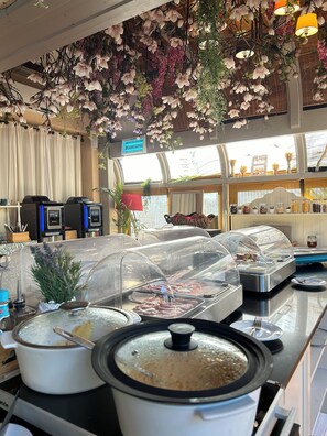 Daily buffet breakfast (EUR 20 per person)