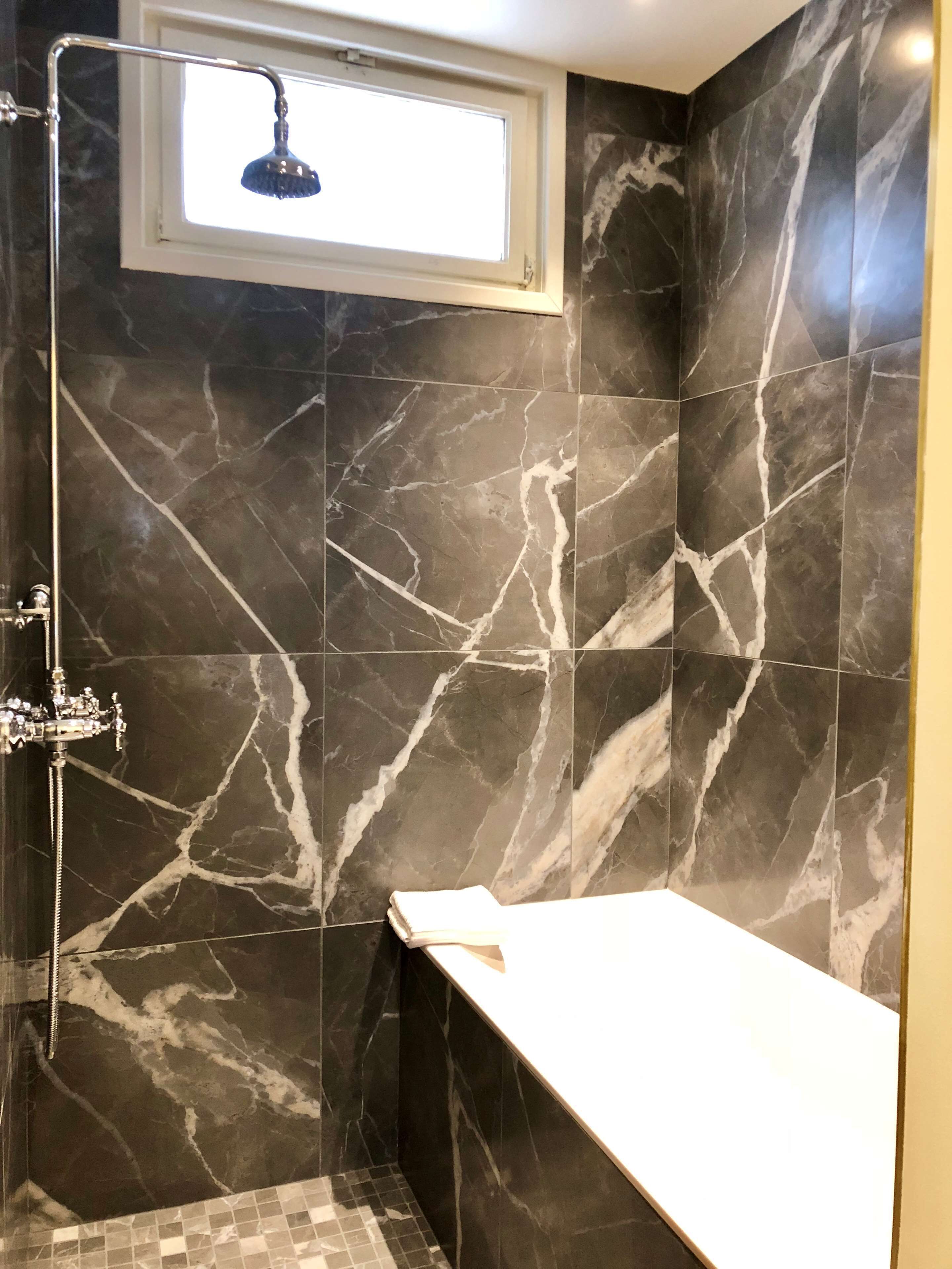 bathtub, free toiletries, hair dryer, towels