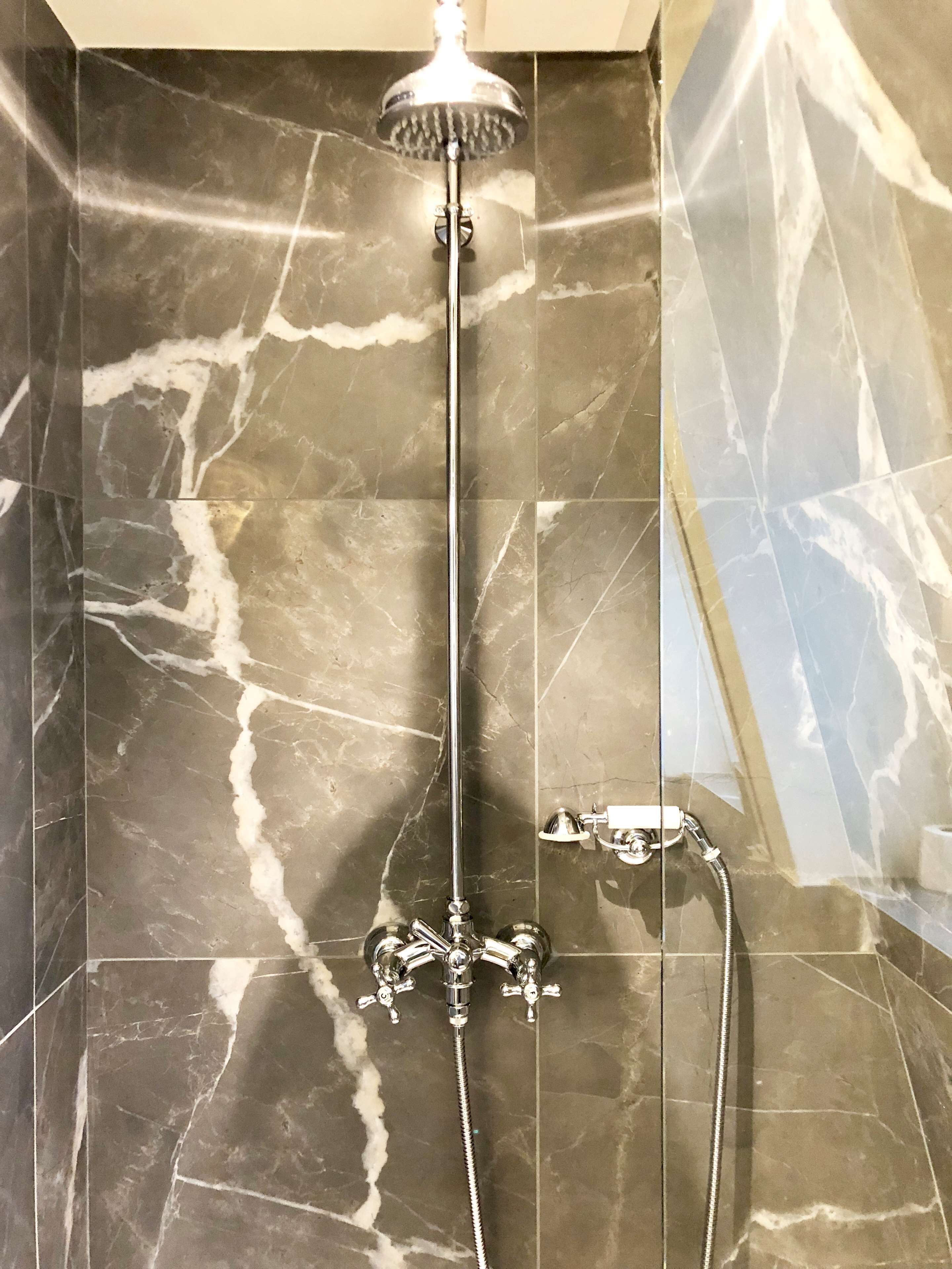 bathtub, free toiletries, hair dryer, towels