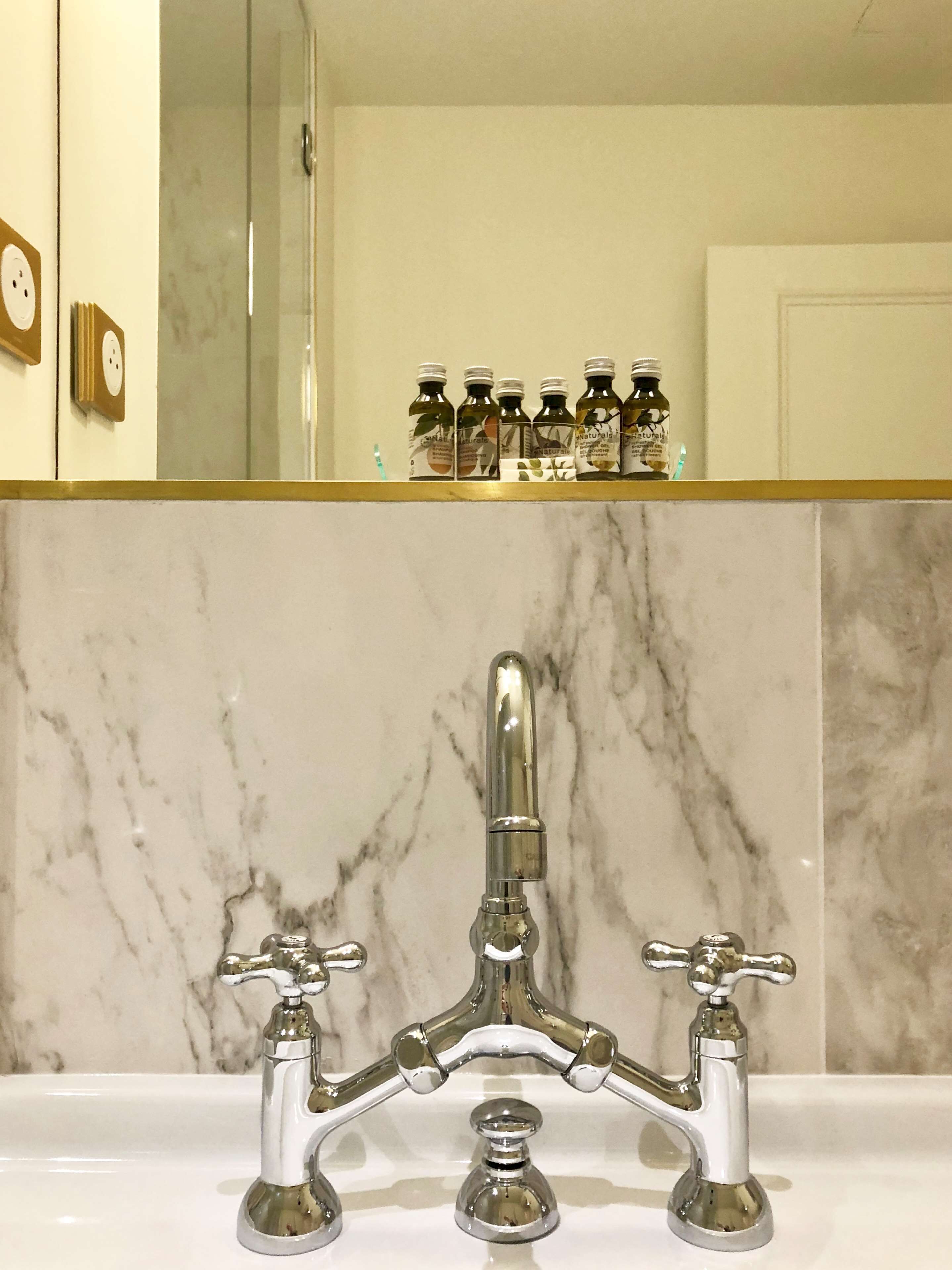 bathtub, free toiletries, hair dryer, towels