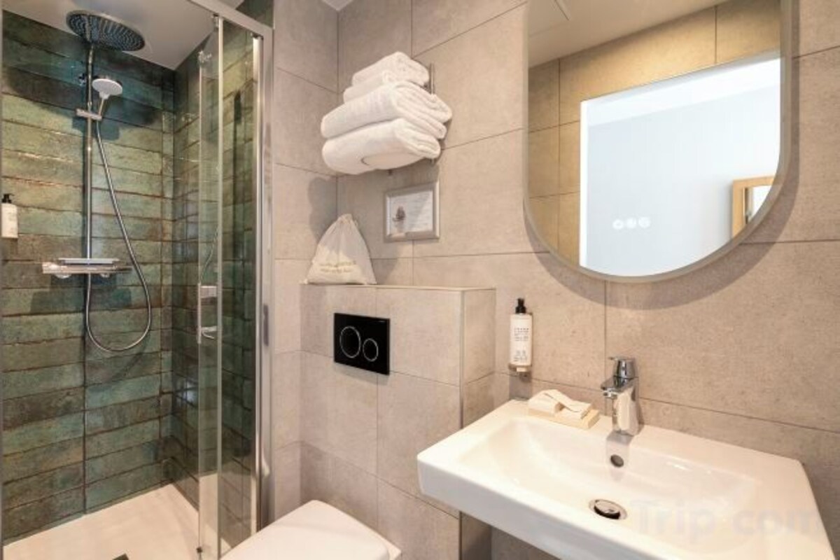 Bathroom | Shower, hair dryer, towels