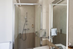Eco-friendly toiletries, hair dryer, towels, soap