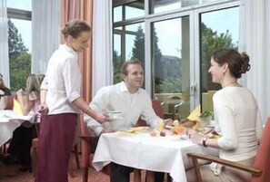 Breakfast, lunch, dinner served; international cuisine