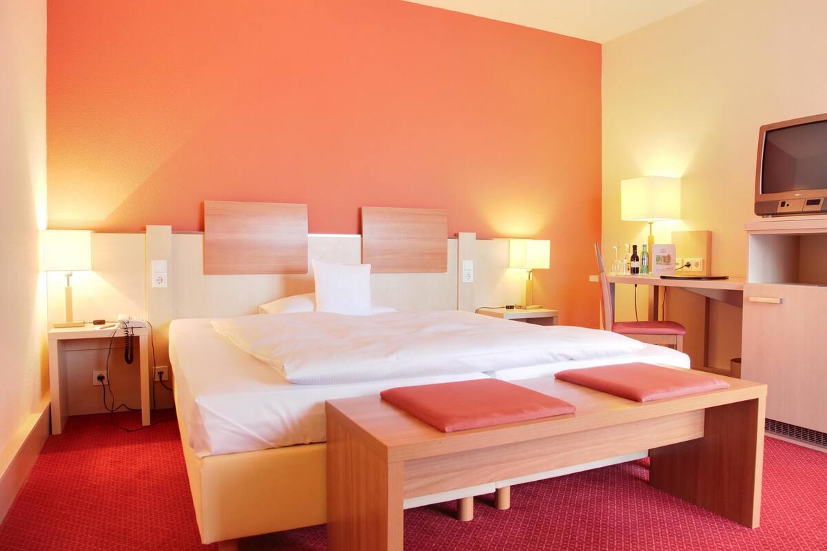 Premium bedding, minibar, desk, cribs/infant beds