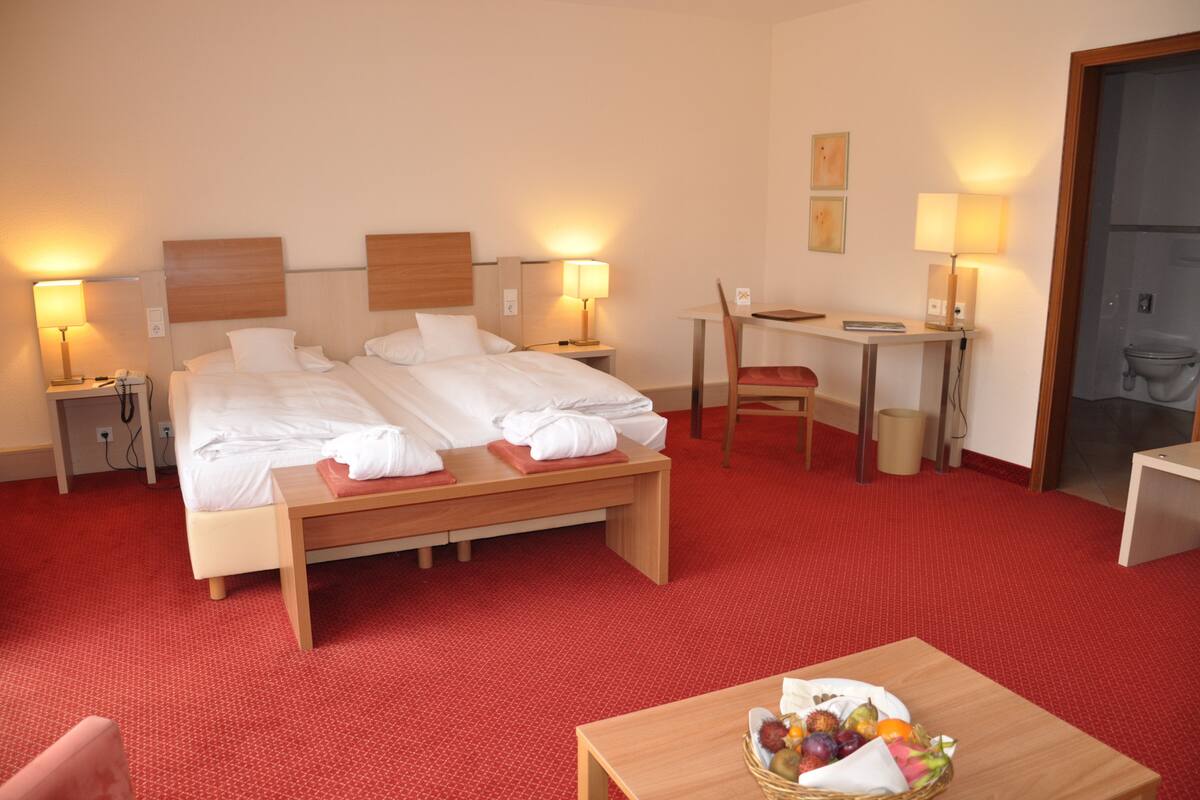 Premium bedding, minibar, desk, cribs/infant beds