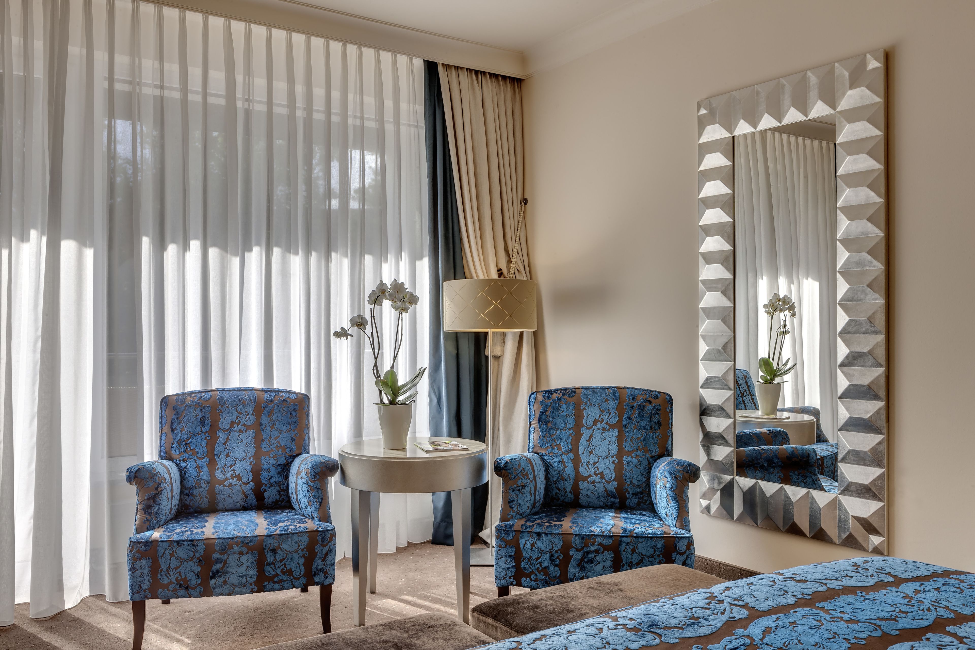 deluxe double room, 1 king bed, balcony | living area | flat-screen tv