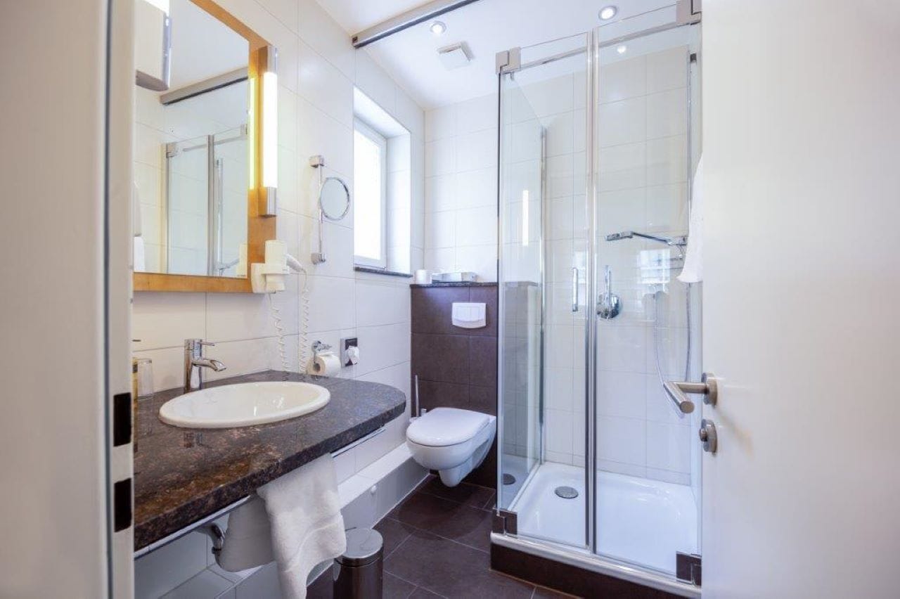 shower, free toiletries, hair dryer, slippers