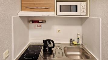 Habitación estándar, 1 cama individual | Caja de seguridad en la habitación, escritorio y insonorización