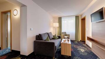 Suite, 2 Einzelbetten | Zimmersafe, kostenloses WLAN, BettwÀsche