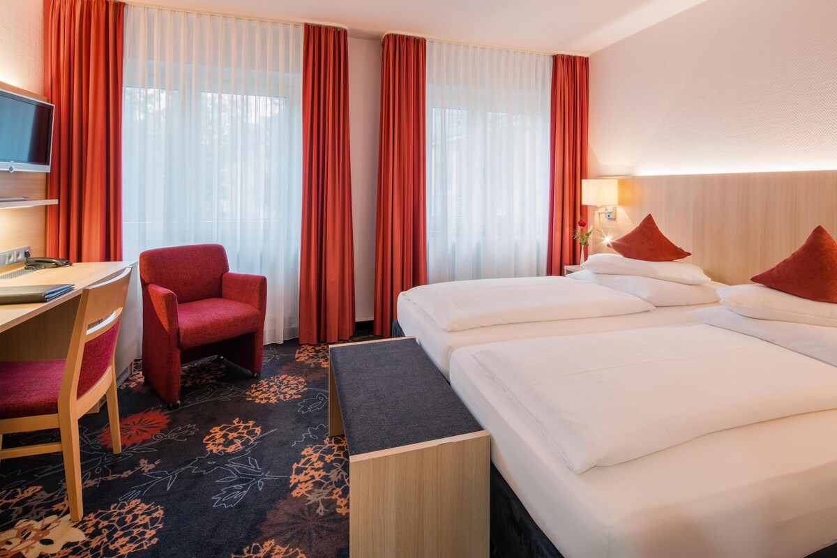 Chambre Standard, 2 lits jumeaux | Coffre-fort, accès au Wi-Fi (inclus), literie fournie