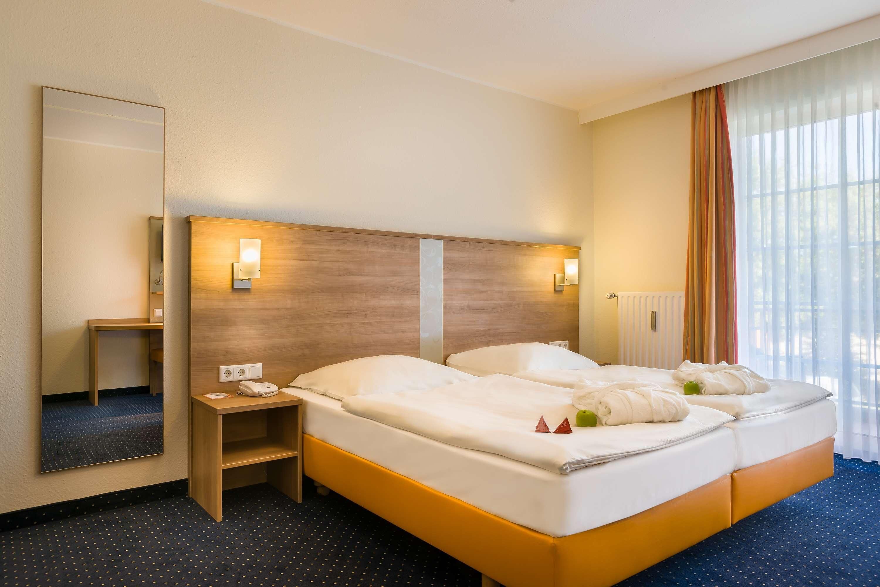 Hypo-allergenic bedding, in-room safe, desk, laptop workspace