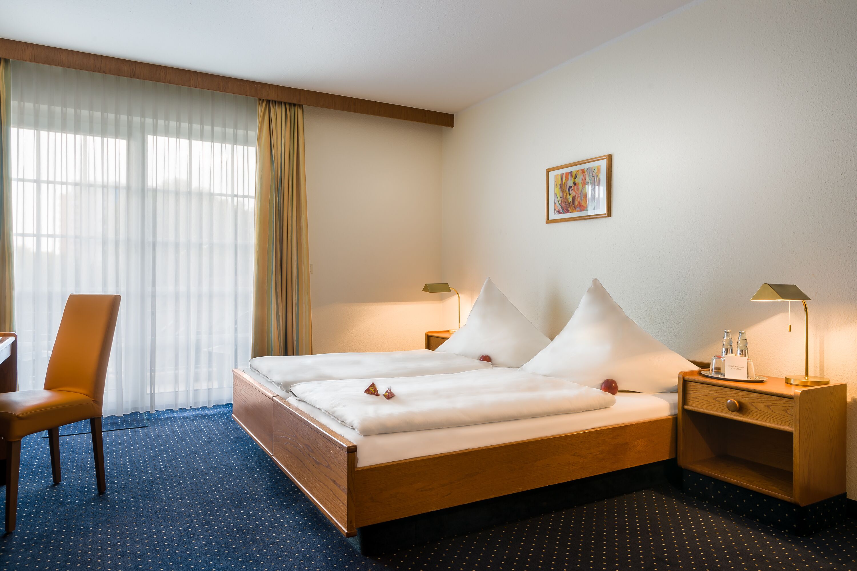 Hypo-allergenic bedding, in-room safe, desk, laptop workspace
