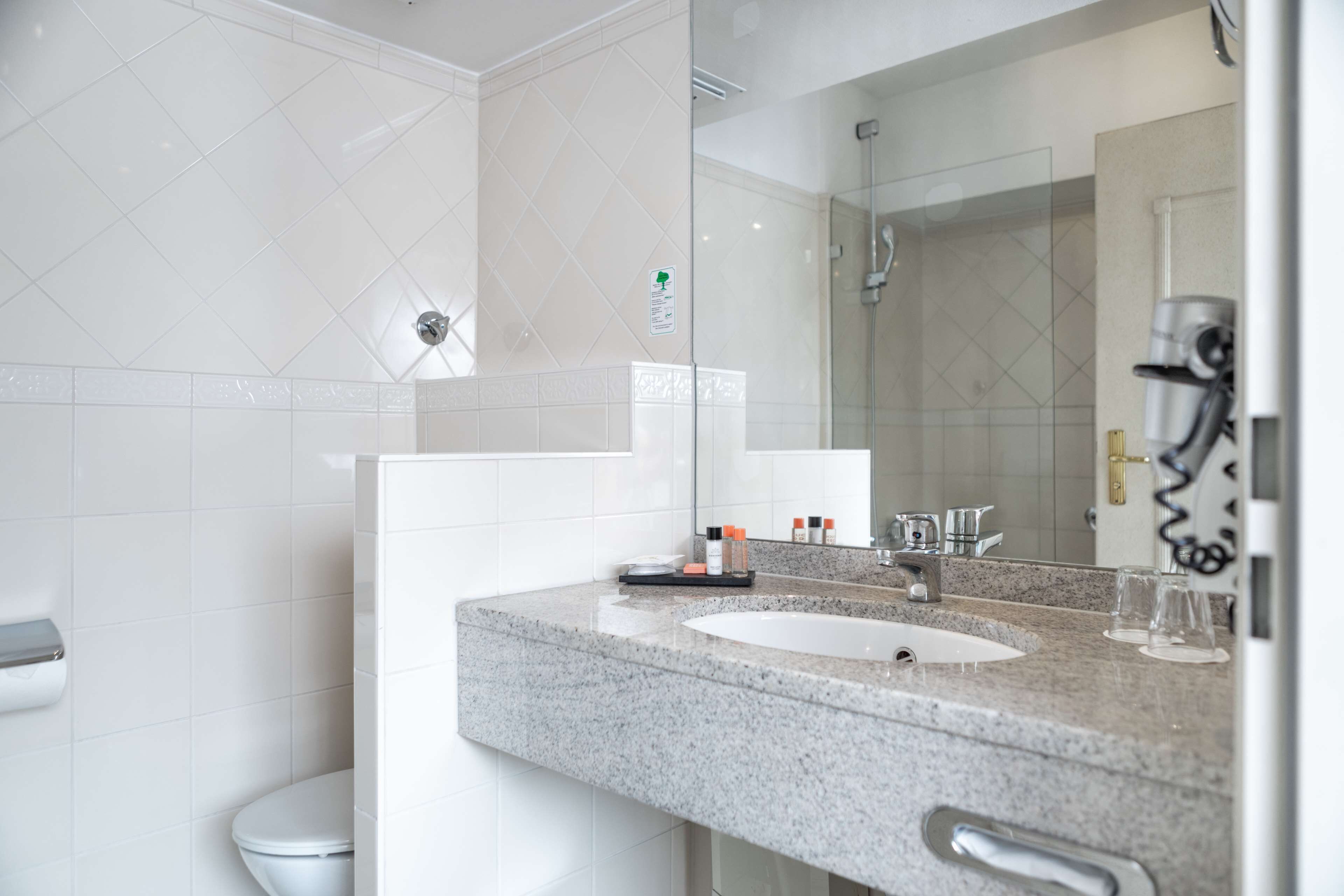 shower, free toiletries, hair dryer, towels