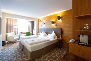 Premium bedding, desk, laptop workspace, blackout curtains
