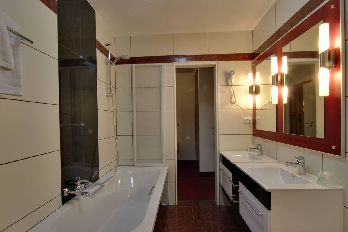family room | bathroom | shower, hair dryer, towels