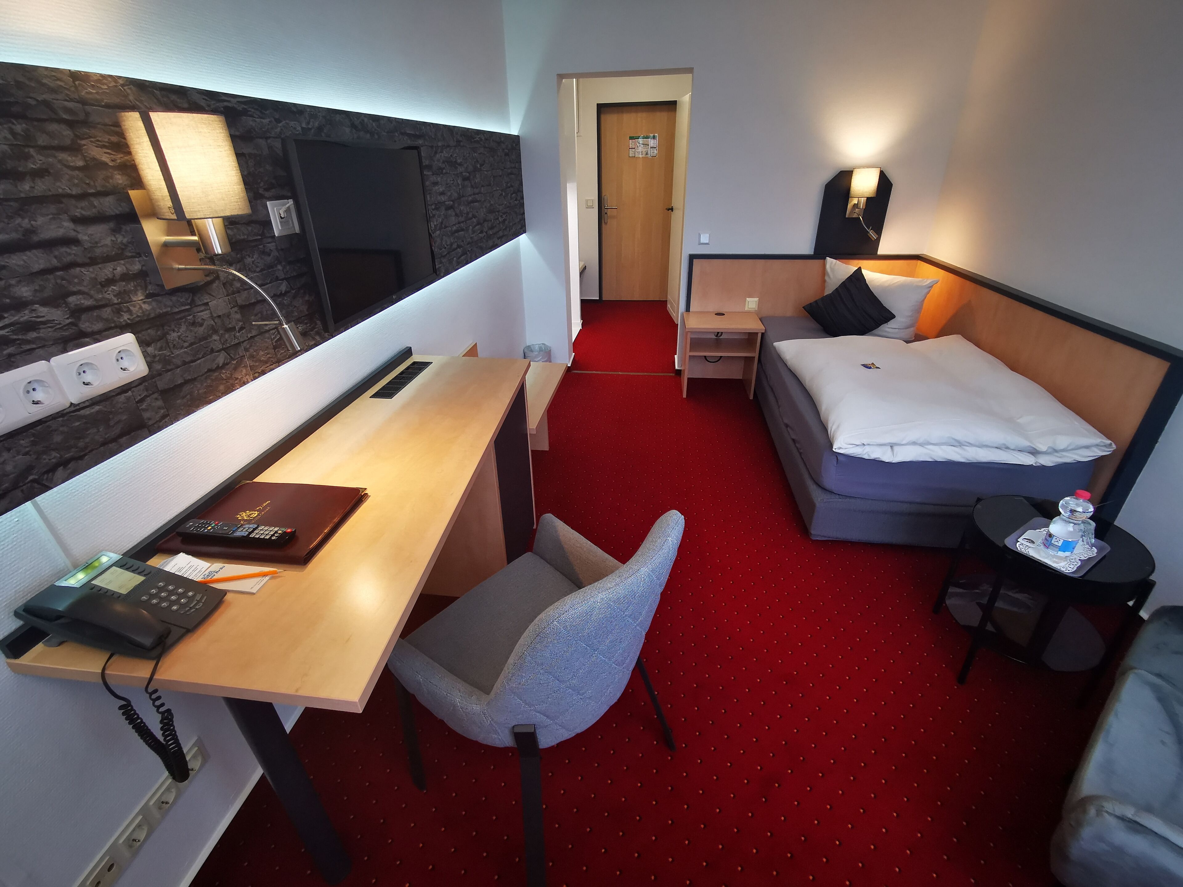 single room | living area | flat-screen tv