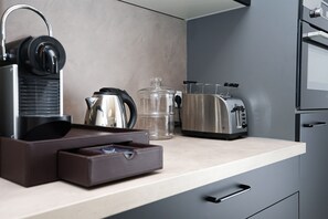 Apartment | Private kitchen | Oven, stovetop, dishwasher, espresso maker