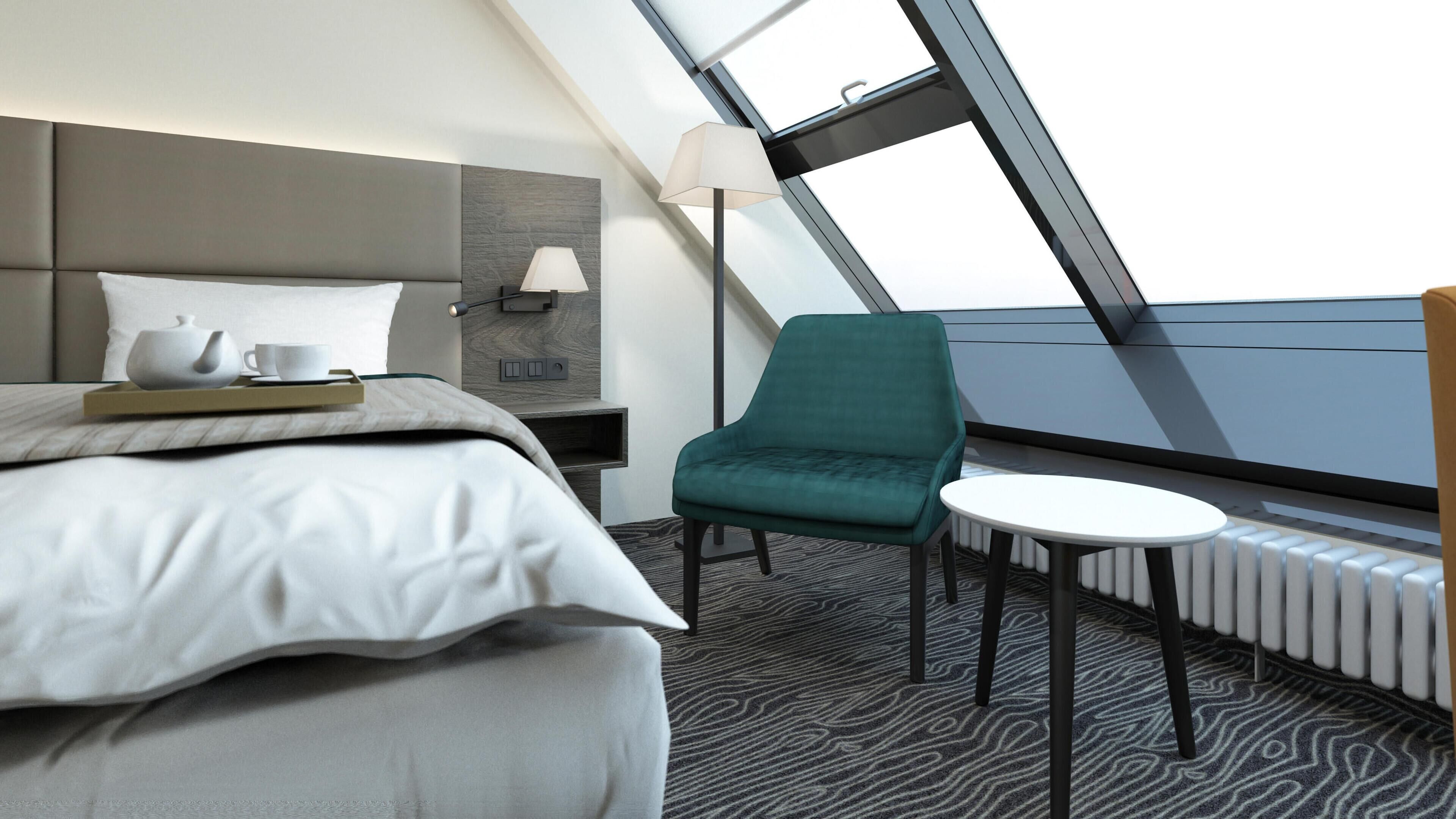 Ein modernes Hotelzimmer mit einem Bett, einem grünen Sessel, einem kleinen Tisch, einem Nachttisch, einer Lampe und Blick durch ein Dachfenster.