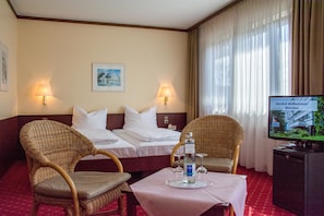 Comfort-Doppelzimmer | Hochwertige Bettwaren, Select-Comfort-Betten, individuell dekoriert