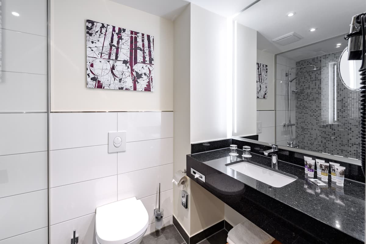 combined shower/bathtub, deep-soaking bathtub, eco-friendly toiletries