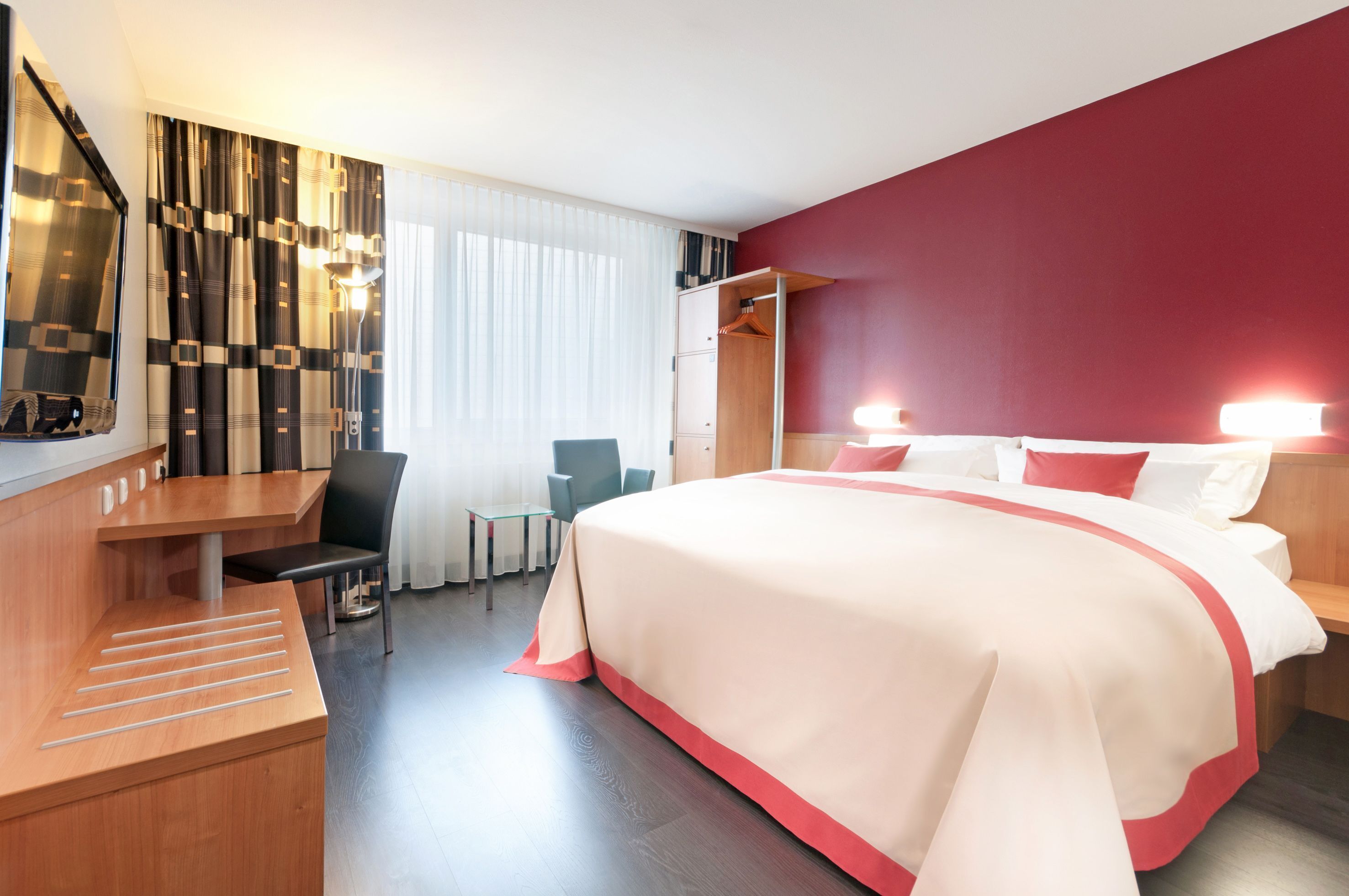 Premium bedding, pillowtop beds, desk, blackout drapes