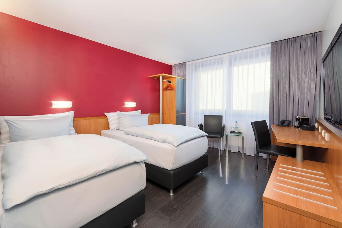 standard room | premium bedding, pillow-top beds, desk, blackout curtains