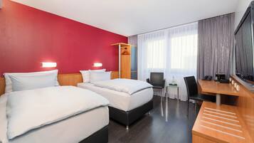 Standardzimmer | Hochwertige Bettwaren, Pillowtop-Betten, Schreibtisch