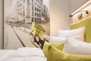 Premium bedding, blackout drapes, iron/ironing board, free WiFi