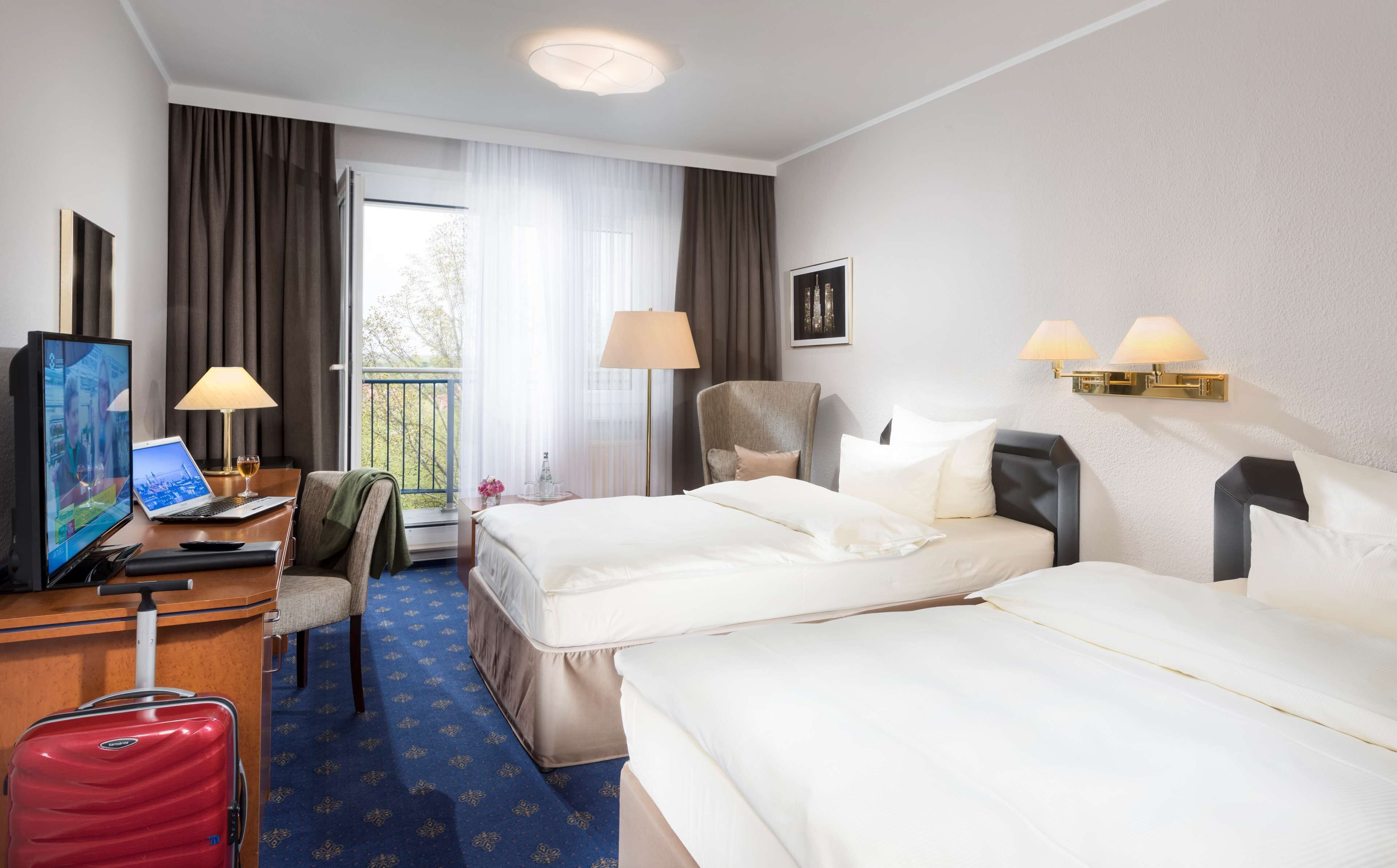 Premium bedding, blackout curtains, iron/ironing board, free WiFi