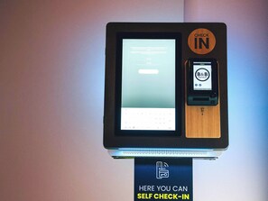 Check-in/check-out kiosk