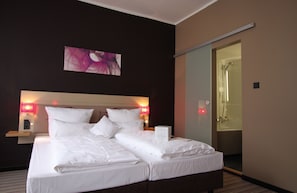 Deluxe Room | Premium bedding, in-room safe, desk, blackout curtains