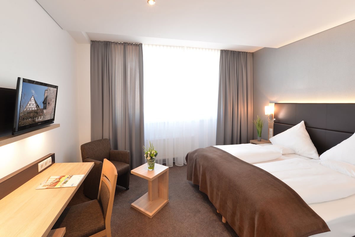 Ropa de cama hipoalergénica y minibar