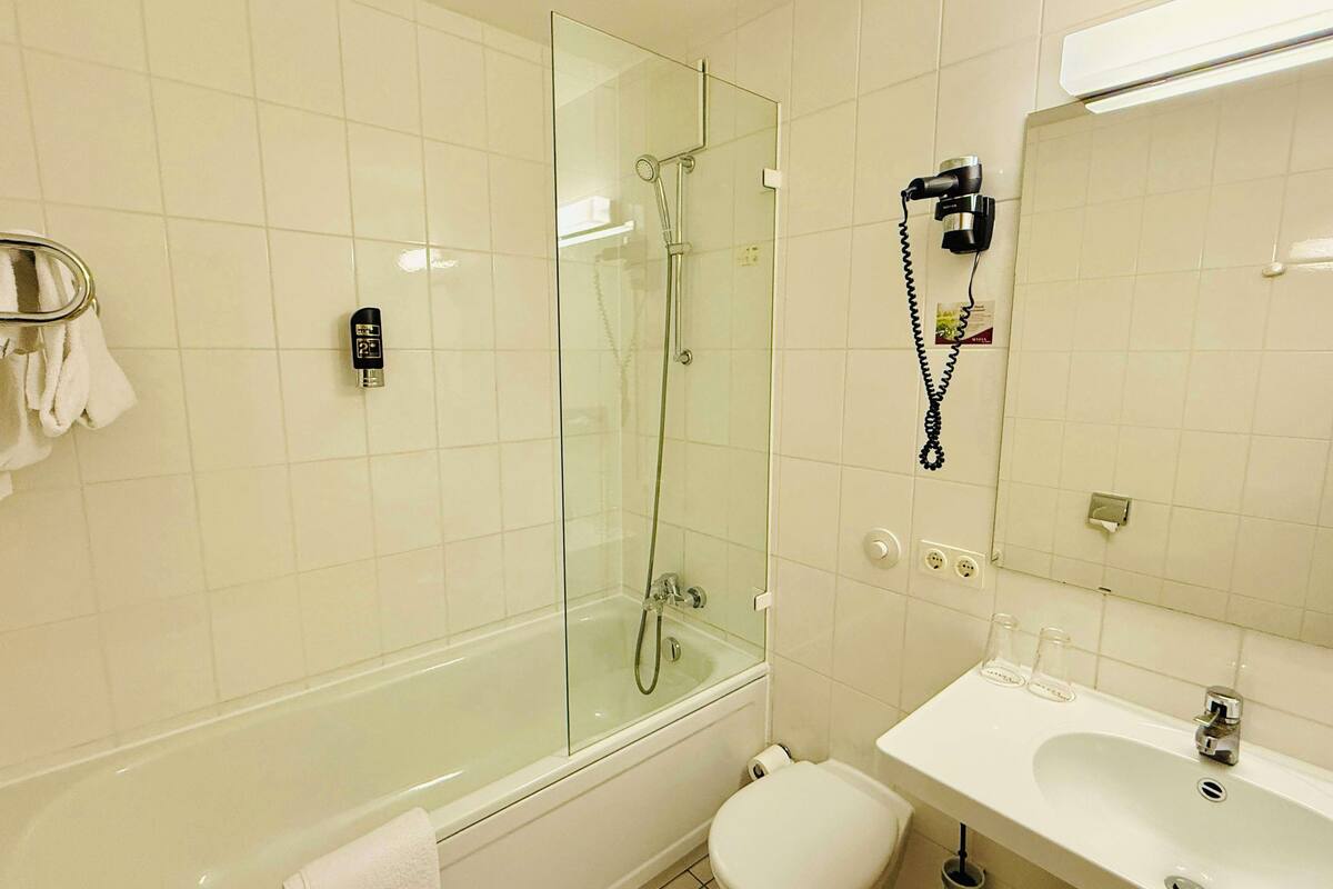 double room | bathroom | deep-soaking bathtub, free toiletries, hair dryer, towels