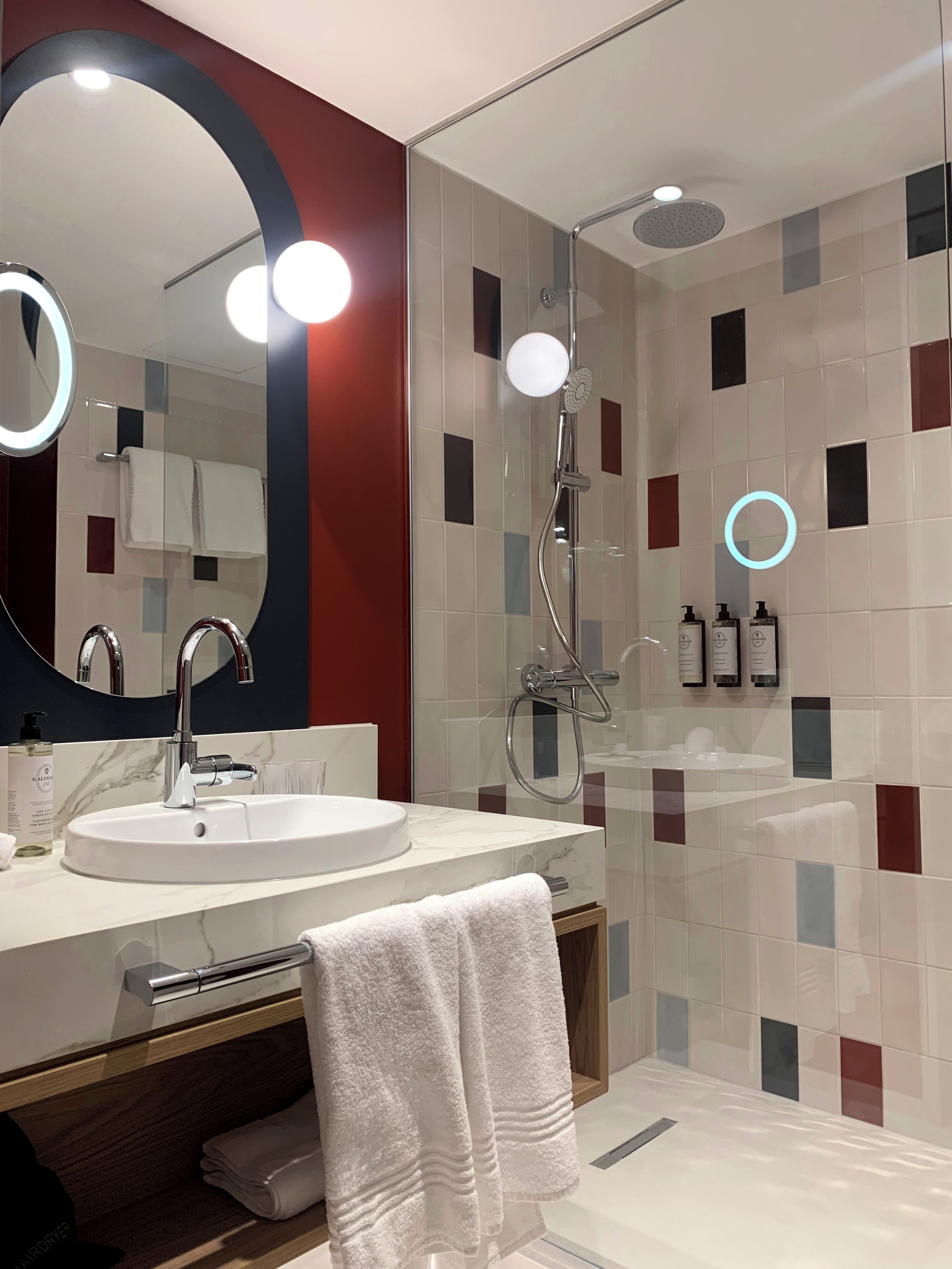 Shower, rainfall showerhead, eco-friendly toiletries, hair dryer
