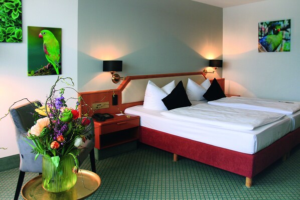 Hypo-allergenic bedding, minibar, desk, laptop workspace