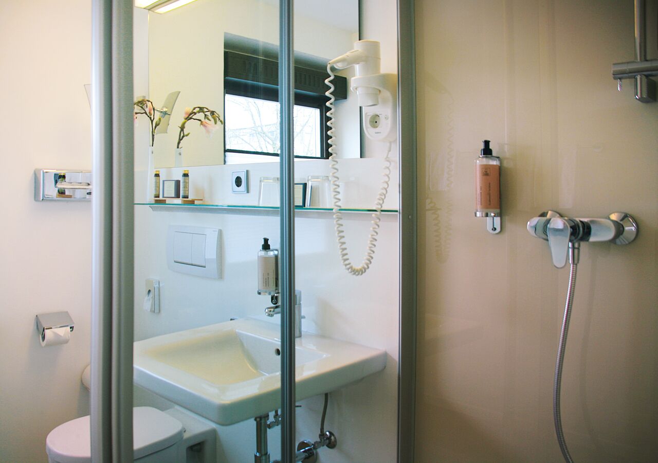 family triple room | bathroom | free toiletries, hair dryer, towels, soap