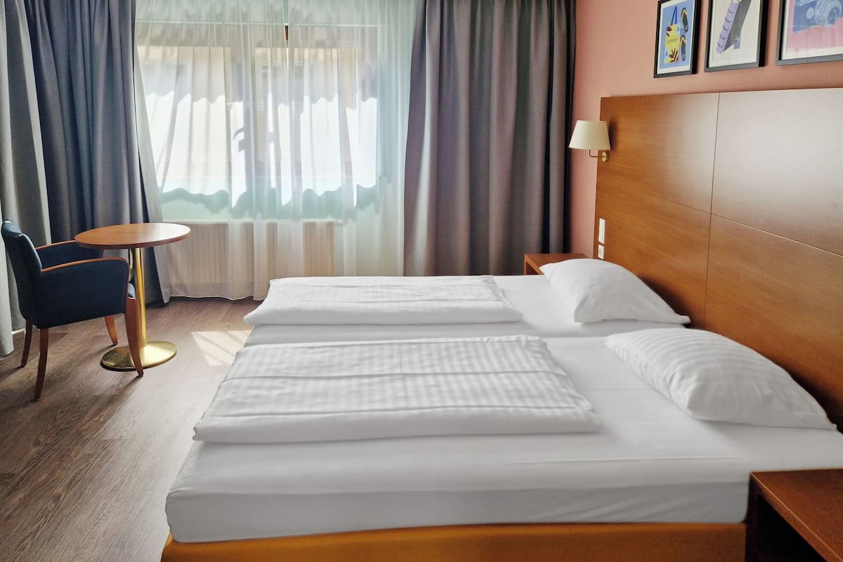 Hypo-allergenic bedding, minibar, in-room safe, desk