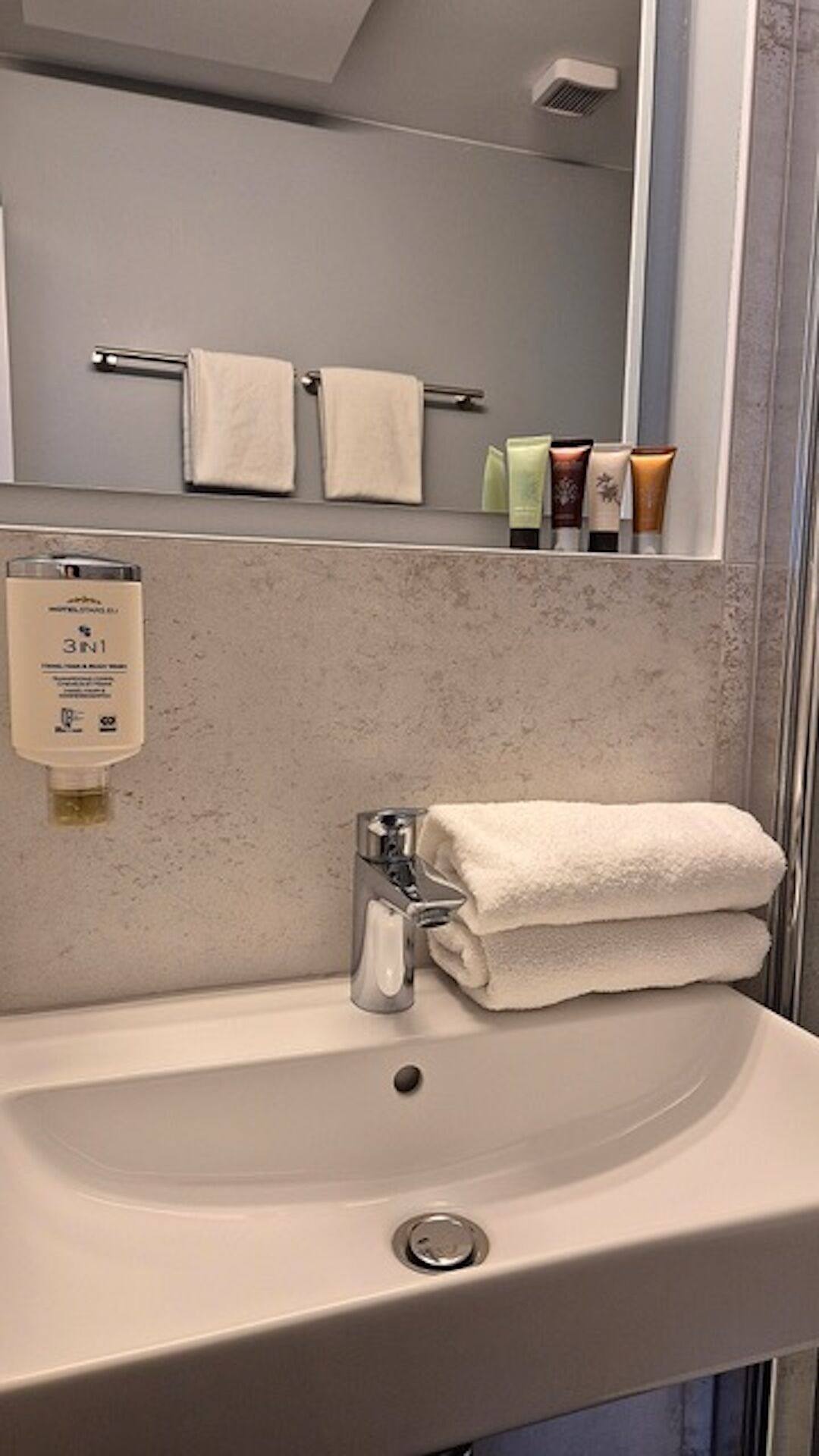 senior suite | bathroom | shower, hair dryer, towels