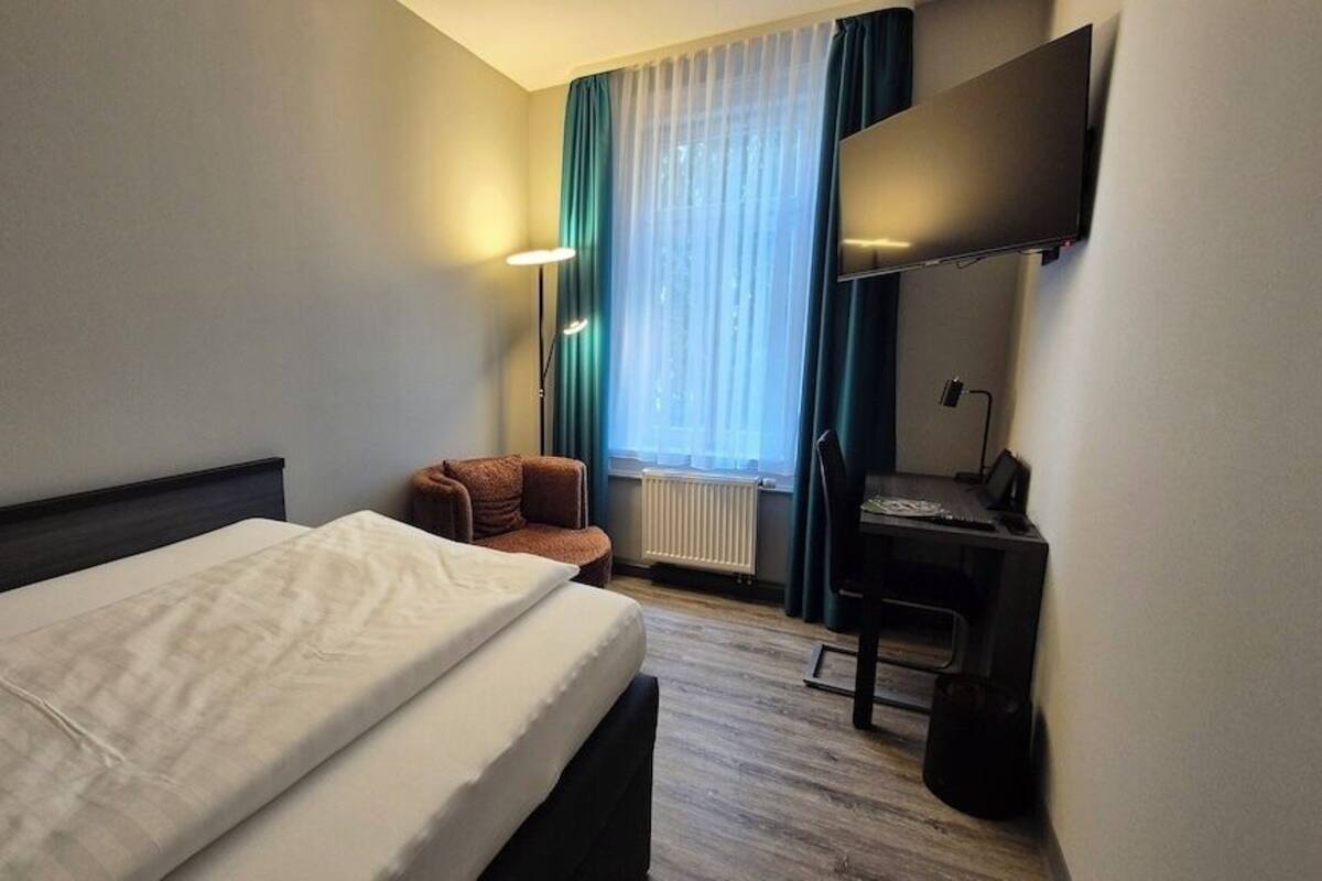 Apartamento | Ropa de cama hipoalergénica, escritorio, cortinas opacas