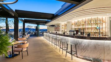 Rooftop bar, pool views, open daily
