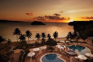 2 outdoor pools, open 9:30 AM to 5:30 PM, pool umbrellas