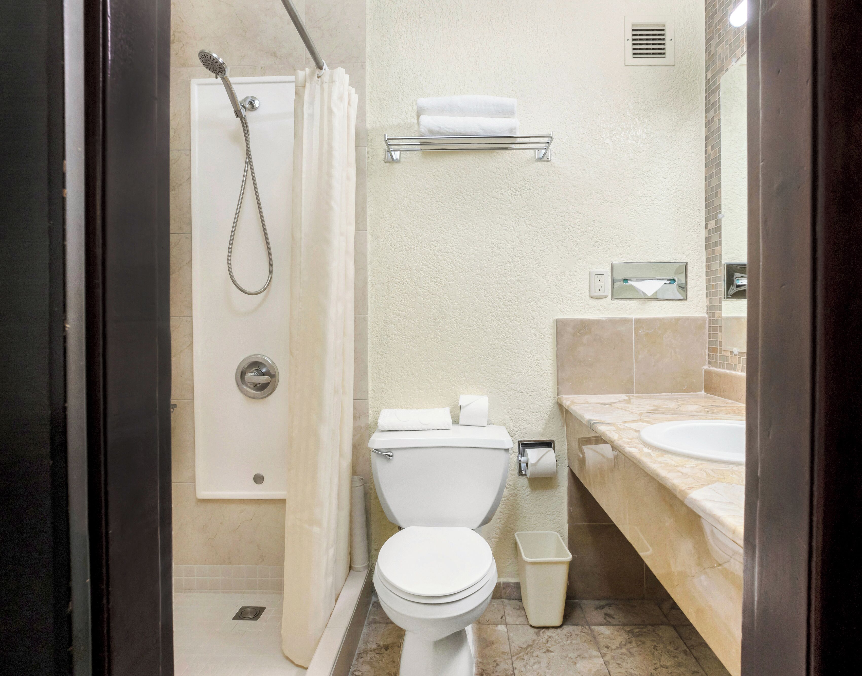 shower, free toiletries, hair dryer, towels